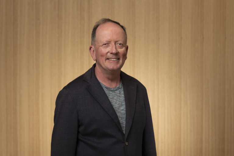 Councillor Andrew Sullivan smiling.